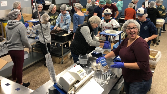 Zion Packs Meals at Feed My Starving Children